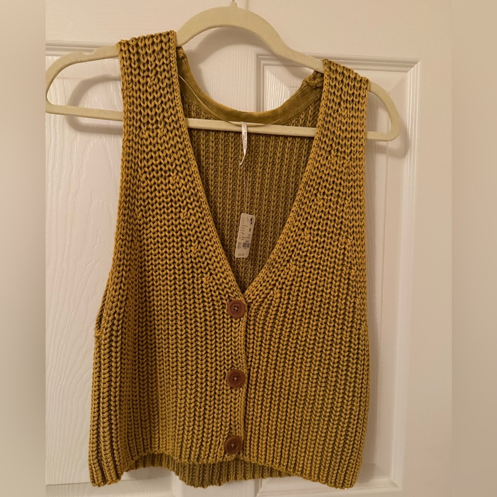 Free People knit vest. Brand new with tags. Perfect for Fall.
